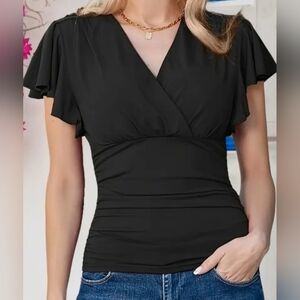 Women's casual ruched top with V-neck, fitted waist. and ruffled sleeves.